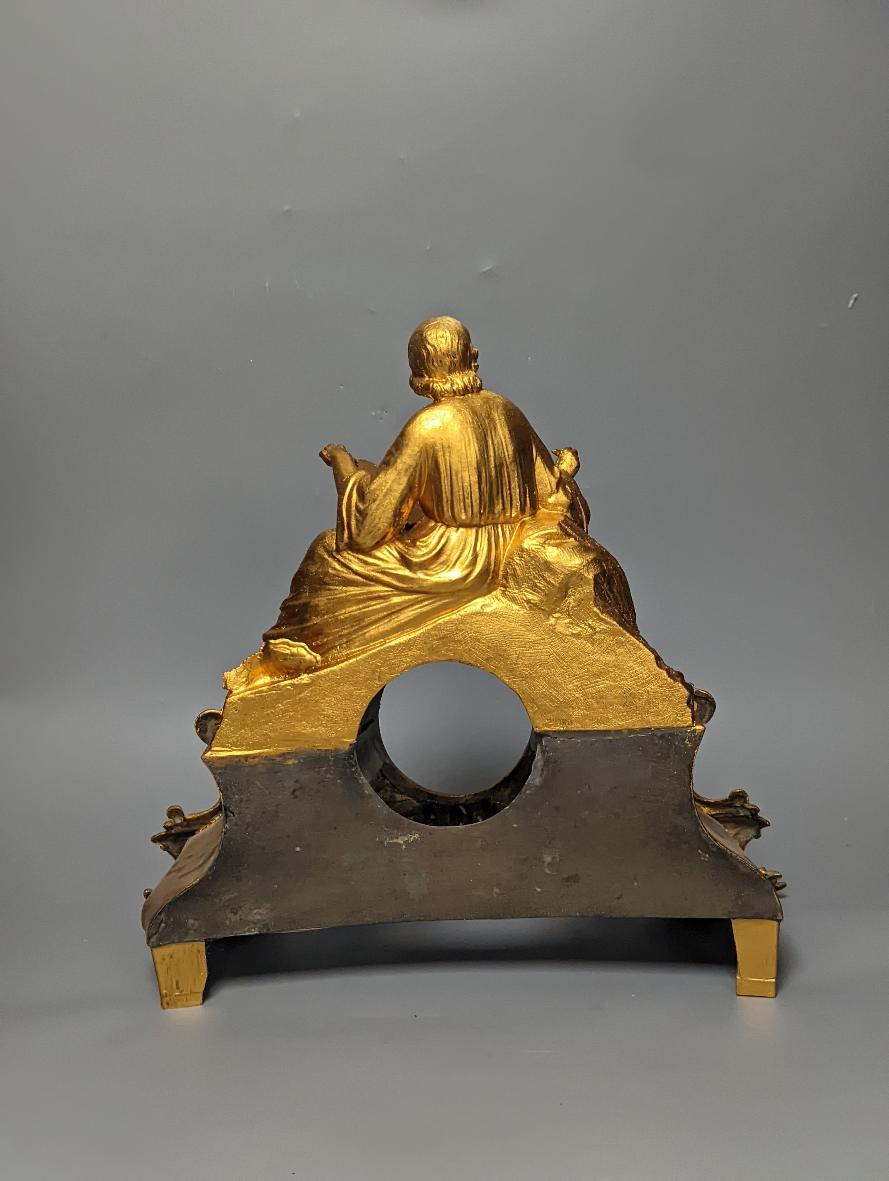 A 19th century gilt metal mantel clock case 37cm